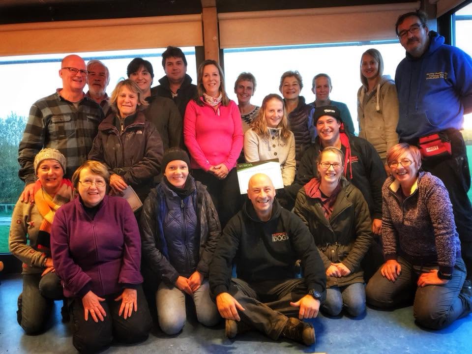 Course group holding a certificate after a practical training day