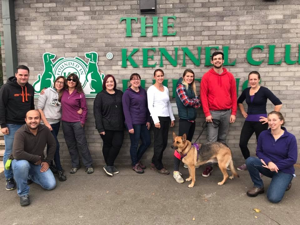 Course group with a German Shepherd outside The Kennel Club building